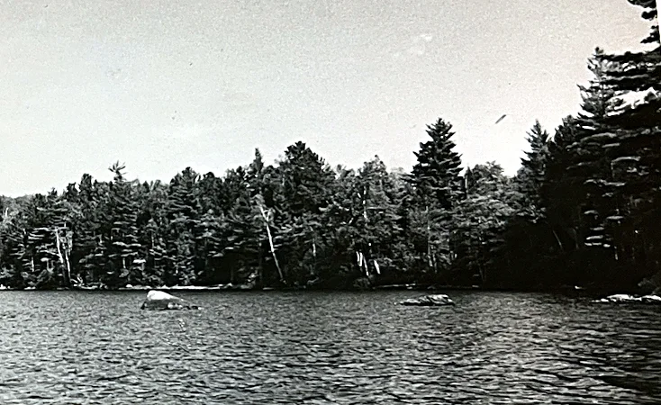 The lake in the 1960s. Take this photo out on the water today and you can find the very spot — the same rocks are still there, easy to recog…